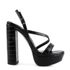 Elegant high heeled sandals by Rag Company in black with a stylish crocodile texture