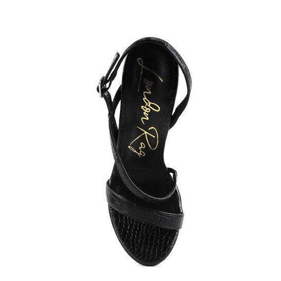 Elegant high heeled sandals by Rag Company in black with a stylish strap design