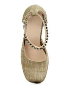 Women's embellished ankle strap heels in gold, perfect for evening wear