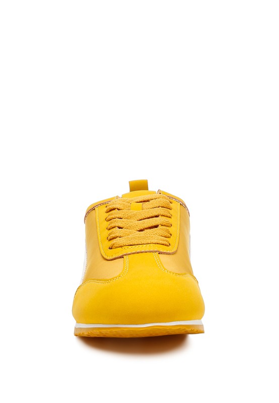 Yellow faux leather lace-up sneakers for stylish women's casual wear