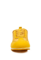 Yellow faux leather lace-up sneakers for stylish women's casual wear