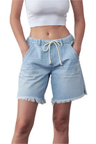 Denim Lab USA women's frayed hem drawstring jean shorts in light blue with pockets