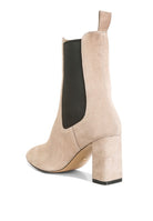 Gaven suede boots in neutral color featuring a block heel and elastic side panels for easy wear