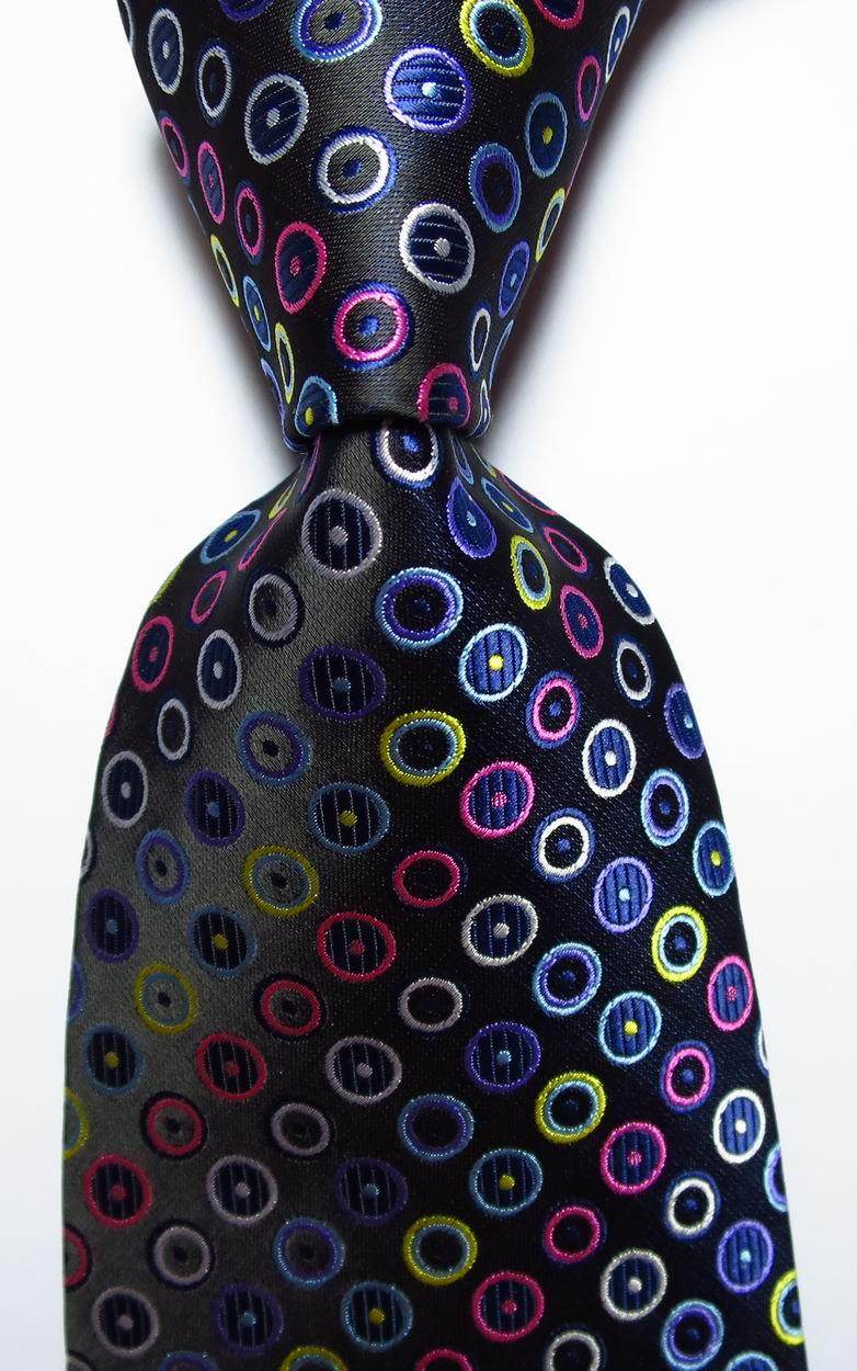 VacationGrabs gold green necktie set featuring a vibrant dotted pattern on a black background
