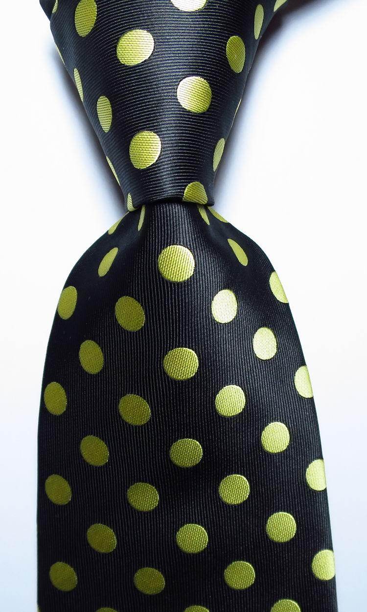 Black necktie with gold and green polka dots from VacationGrabs in a stylish design