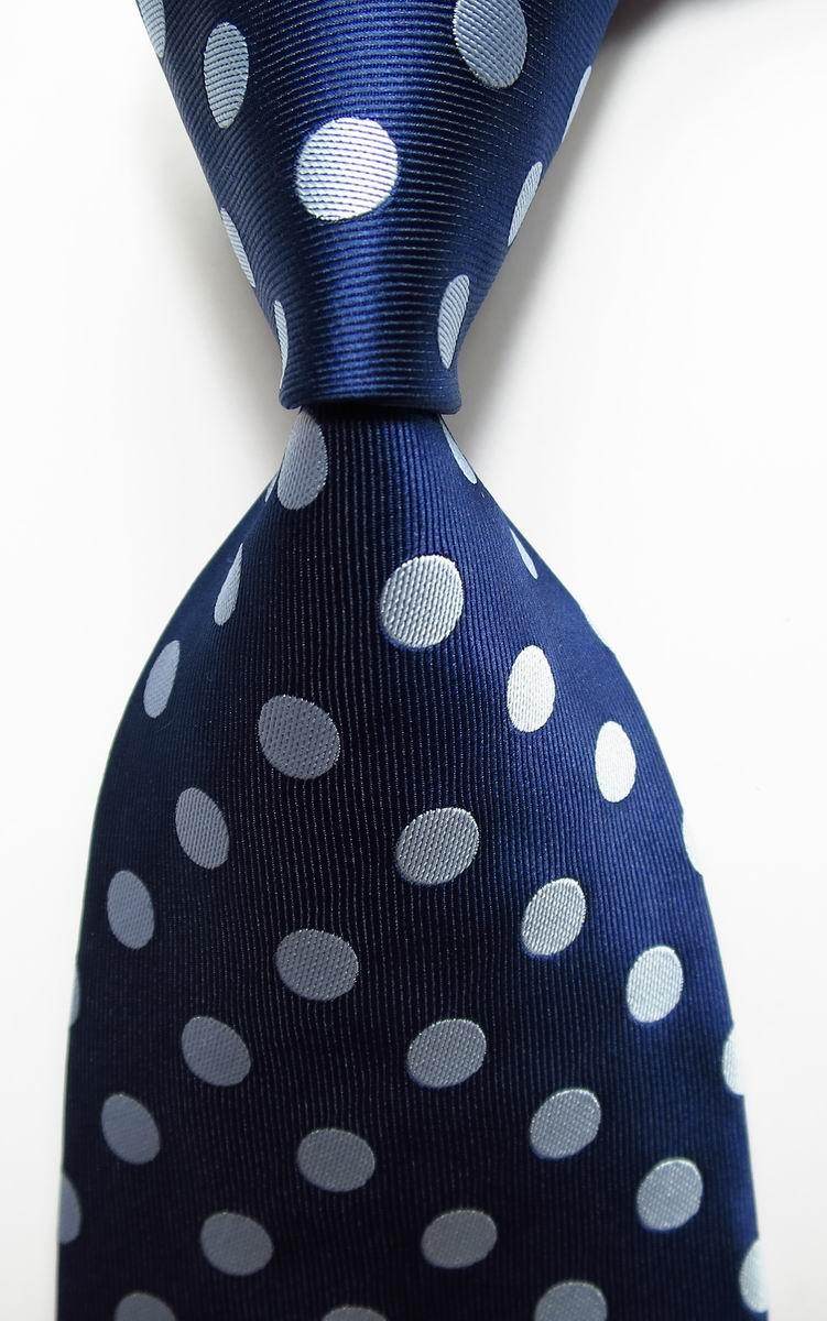 Navy blue tie with light blue polka dots, a stylish addition to the gold green necktie set