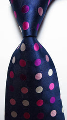Stylish gold green necktie set featuring vibrant polka dots on a navy background
