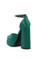 Stylish green Martini sandals with a chunky heel and ankle strap for a chic look