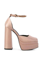 Stylish high heels with block heels and ankle strap, perfect for pairing with outfits, featuring Green Martini Sandals