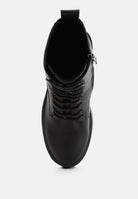 Top view of London Rag International high ankle platform boots with lace-up design and sturdy sole