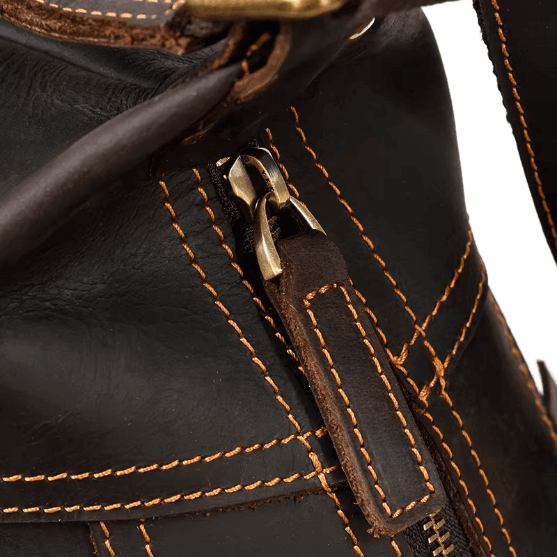 Close-up of a leather travel backpack for men showcasing durable stitching and high-quality craftsmanship