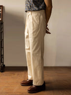 Men's high rise wide leg trousers in cream, perfect for casual outings