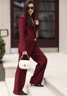 Stylish maroon suit paired with mesh pointed toe mules for a chic, sophisticated look