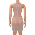 Back view of a mesh rhinestone mini dress with halter neckline and sparkling details on mannequin