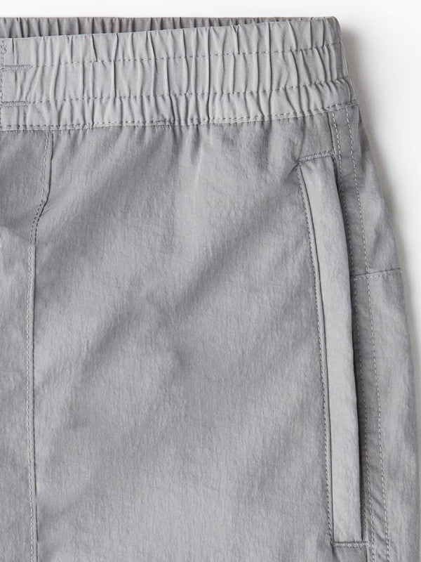 Gray nylon cargo pants for men, versatile and comfortable for daily wear