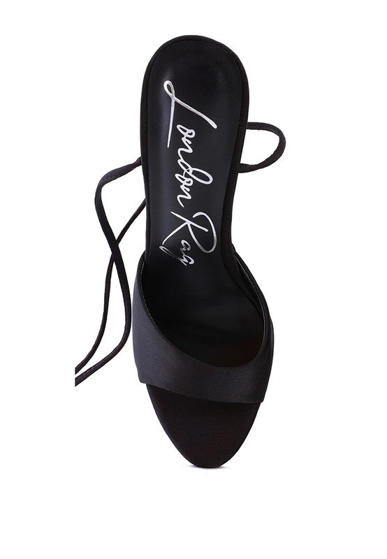 Women's black platform lace-up heel sandals for stylish outings