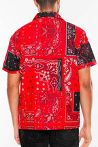 Back view of a men's red bandana print short sleeve shirt by WEIV featuring a bold patchwork design