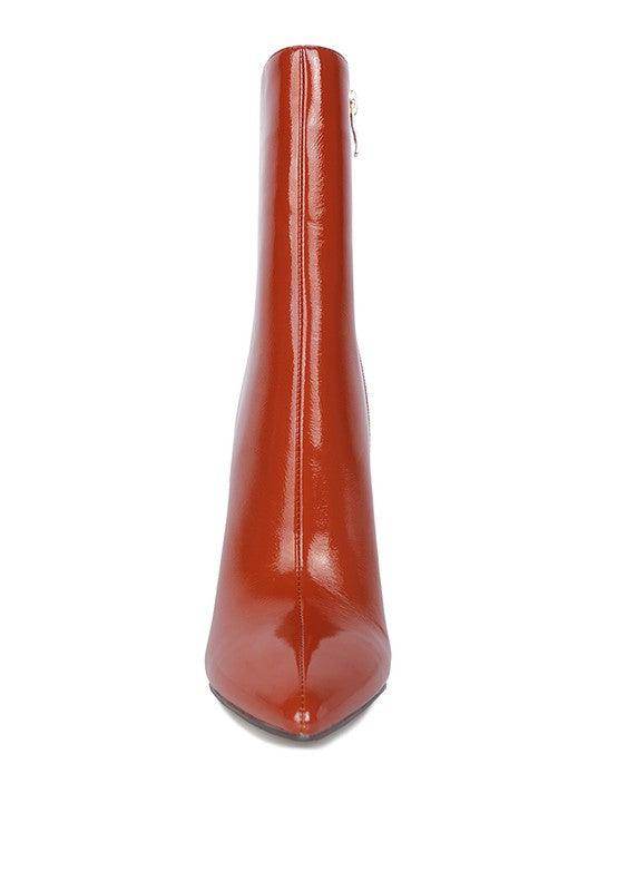 Women's red bottom high heel shoes in glossy leather for stylish outfits
