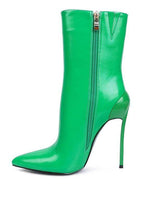 Women's green high heel boots with sleek design and pointed toe