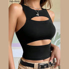 Black sexy hollow bodycon crop top with cutout design styled with beige pants and a belt