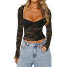 Black sexy lace crop top set with long sleeves worn with light wash denim jeans