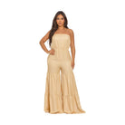 Stylish strapless vacation jumpsuit in beige with flowy wide-leg design for summer outings