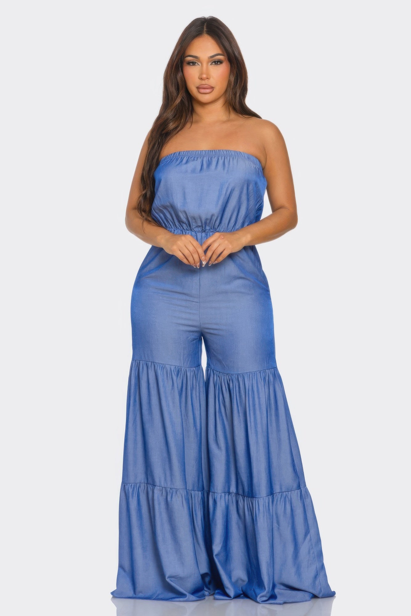 Stylish strapless vacation jumpsuit in blue with flared legs and a relaxed fit for warm weather outings