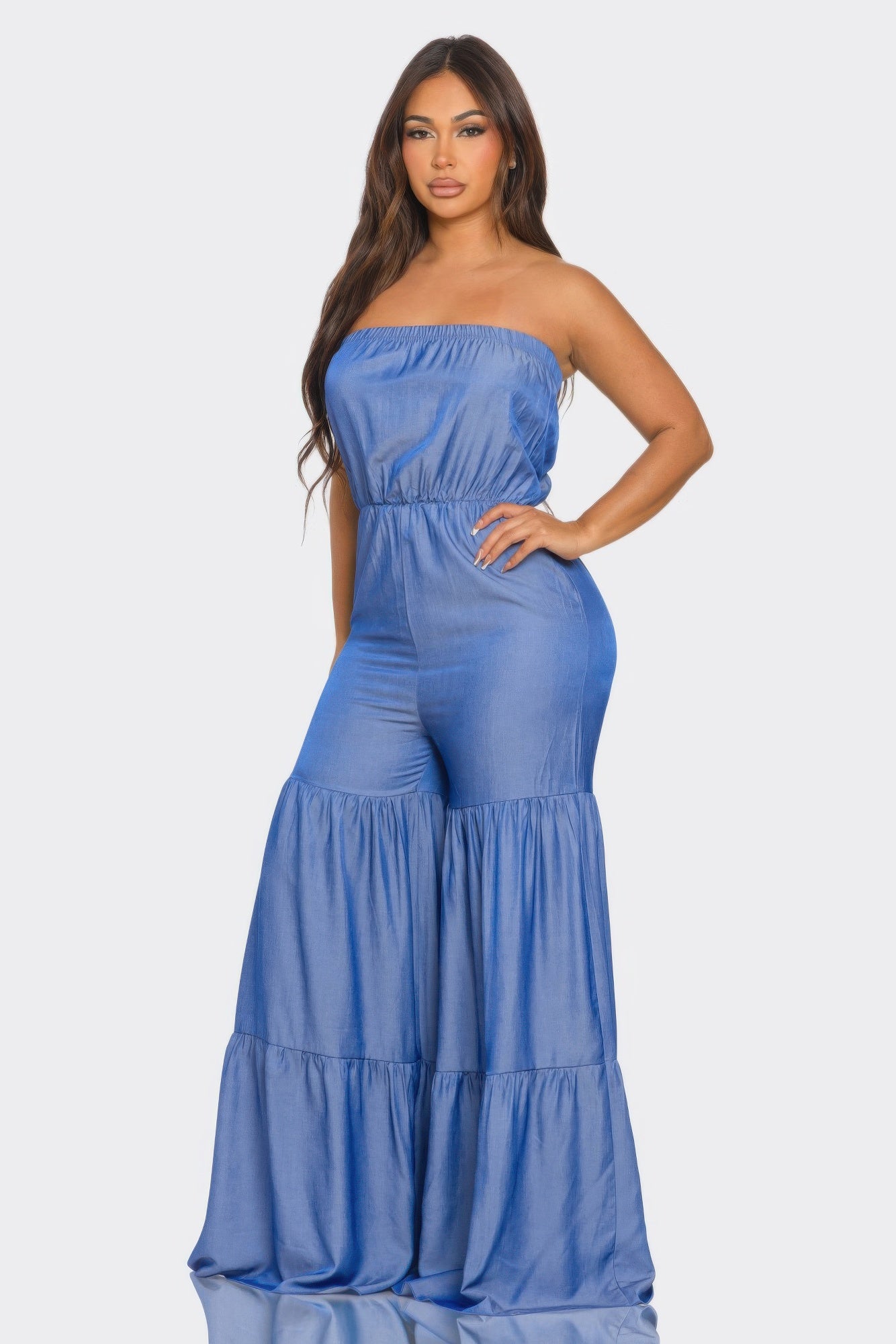 Stylish blue strapless vacation jumpsuit with flared bottoms for comfortable summer outings