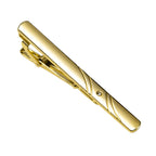 Gold tie clip with sleek design, ideal for formal occasions
