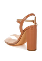 Women's tinted clear strap block heel sandals in nude for stylish summer outings