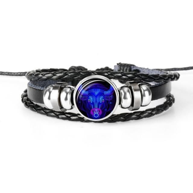 Unique zodiac sign wristbands featuring a blue ram symbol on braided black leather for stylish men