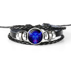Unique zodiac sign wristbands featuring a blue ram symbol on braided black leather for stylish men