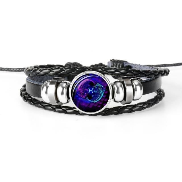 Unique zodiac sign wristbands featuring a braided leather design and colorful zodiac emblem