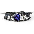Unique zodiac sign wristbands in black leather with a vibrant astrological symbol centerpiece