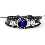 Unique zodiac sign wristbands featuring a braided leather design and a vibrant zodiac symbol centerpiece
