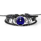 Unique zodiac sign wristbands featuring a blue stone centerpiece and braided leather design