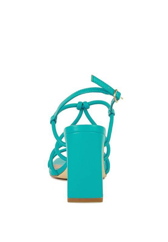 Turquoise Rag Company women's vacation style sandals with a stylish block heel and adjustable ankle strap