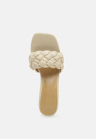 Stylish women's heels with braided strap, perfect for vacation worthy footwear