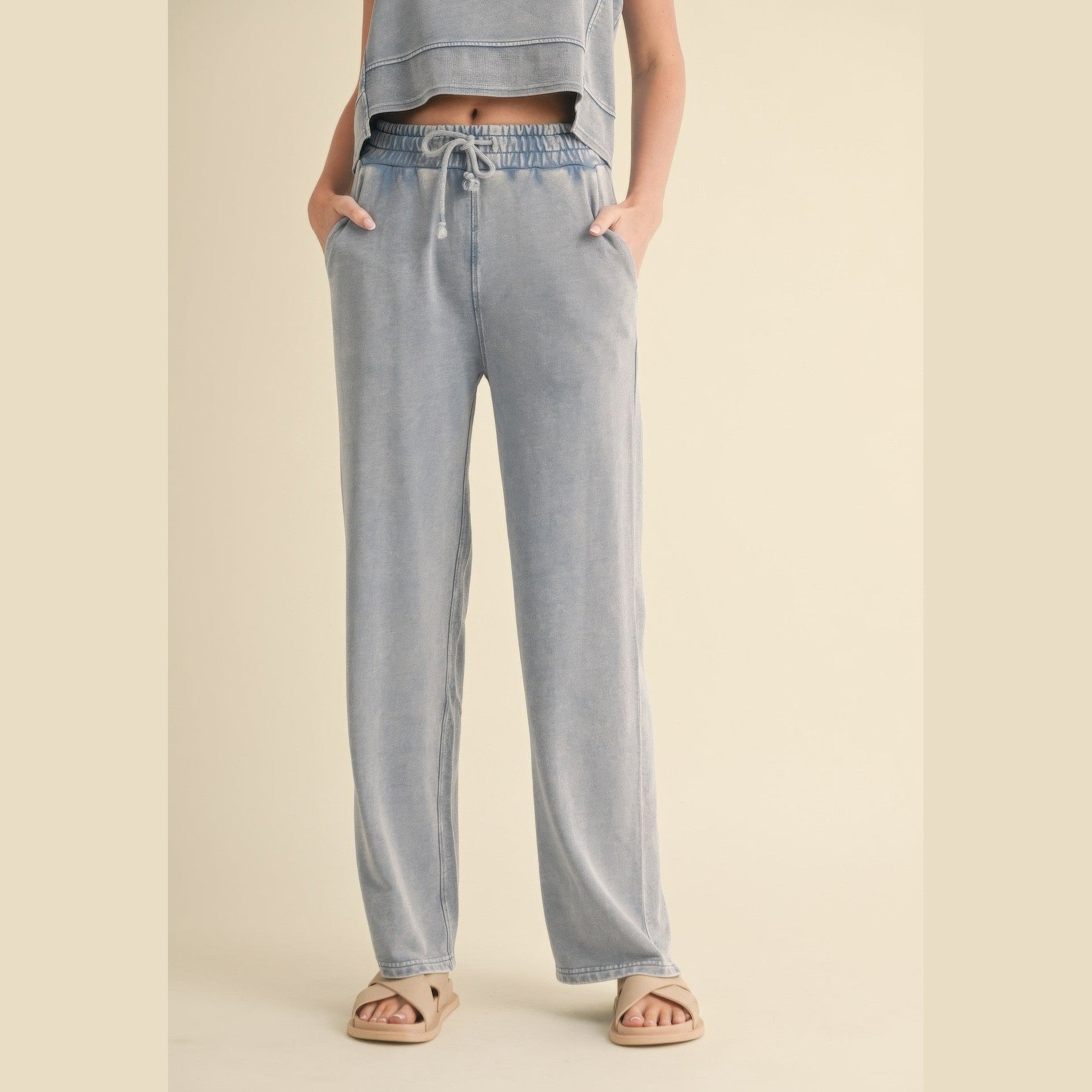 Womens relaxed fit mineral wash trousers in light blue with elastic waistband and drawstring by VacationGrabs