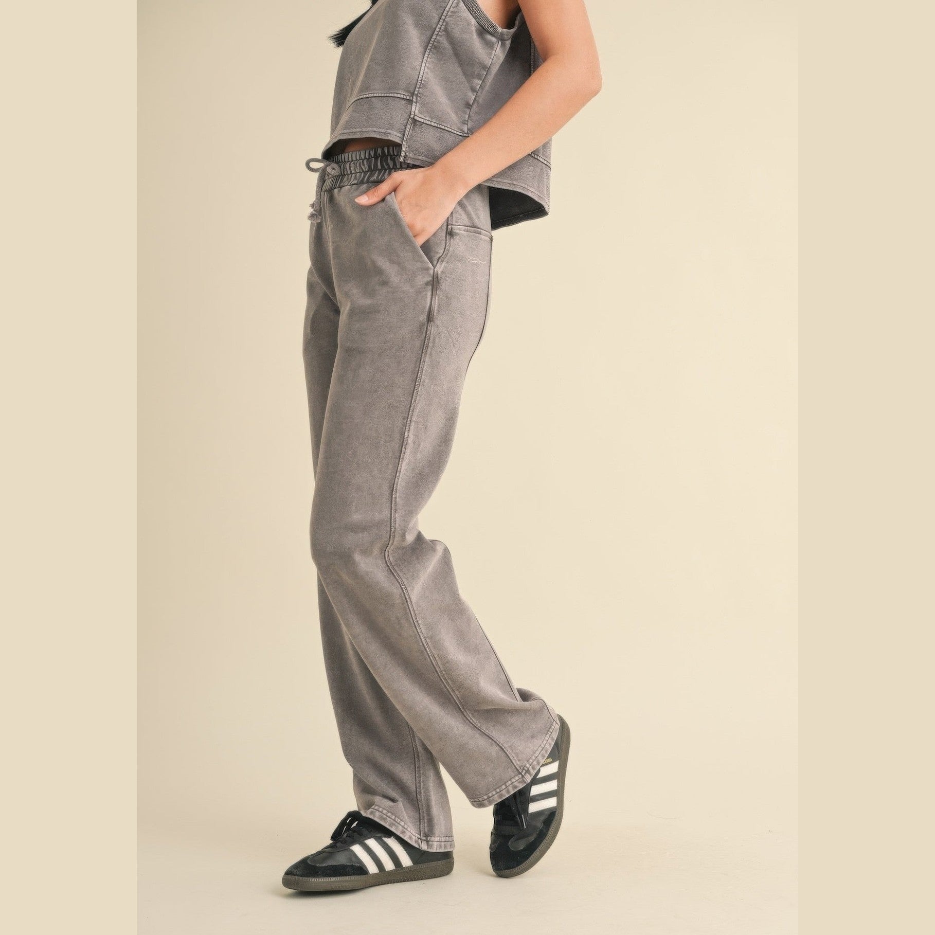 VacationGrabs womens relaxed fit mineral wash trousers in gray styled with black sneakers