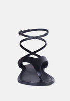 London Rag International wrap up tie flat sandals in black with crossed ankle straps for women