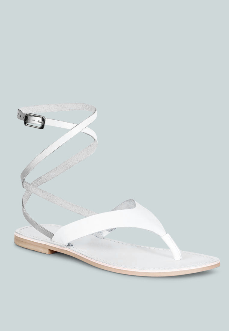 Stylish white wrap up tie flat sandals with ankle straps for casual summer wear