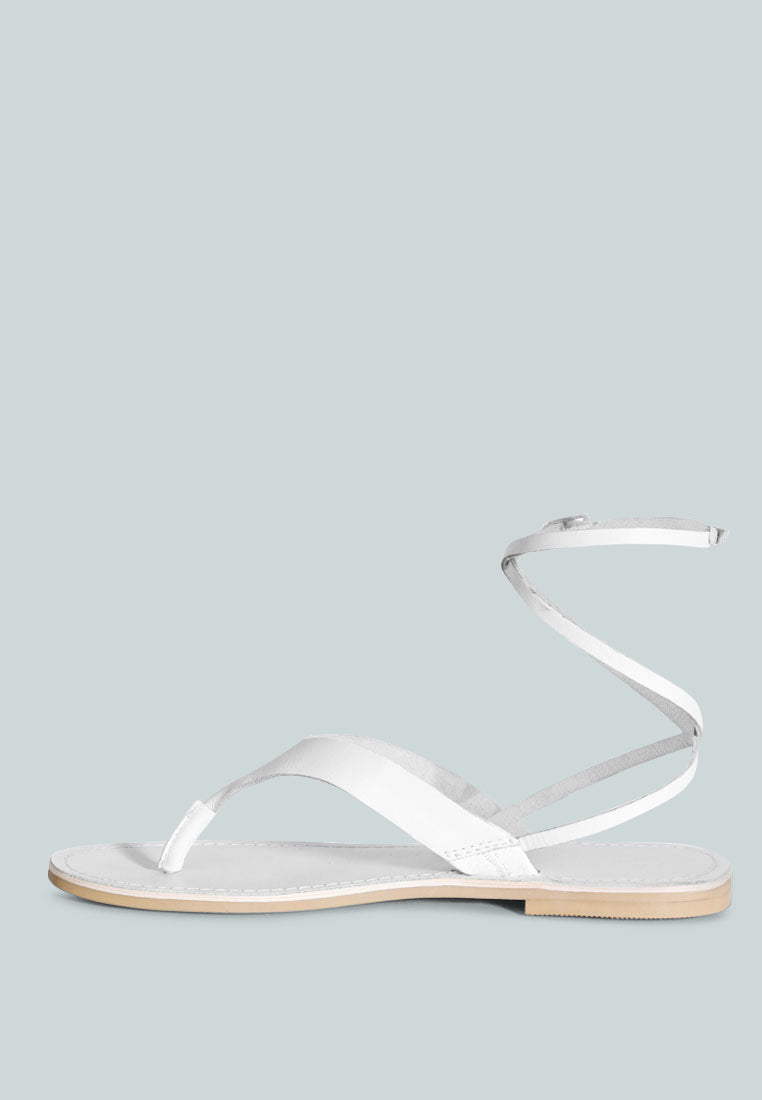 White London Rag wrap up tie flat sandals featuring stylish ankle straps for a trendy look