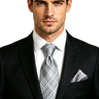 Men's grey plaid pocket square demonstrating how fold a pocket square