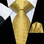 Men's gold silk tie with textured pattern, perfect for formal events