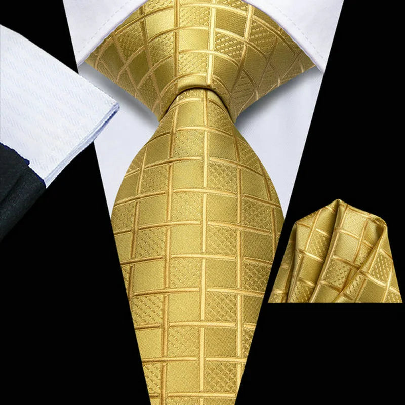 Men's gold silk tie with textured pattern, perfect for formal events