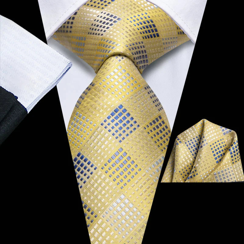 Men's yellow patterned tie with matching pocket square, how to tie men's tie