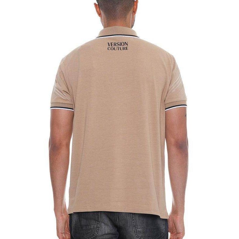 Man wearing a beige polo shirt with 'Version Couture' branding on the back, on a white background.