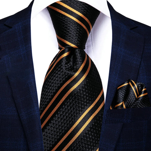 Elegant black and gold tie with matching pocket square for how fold a pocket square