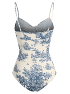 Vintage boho swimsuit set featuring a blue floral design and adjustable straps for a stylish summer look